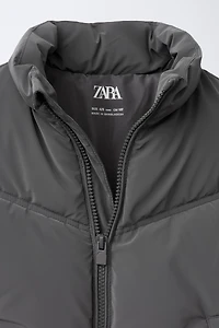 RUBBERIZED VEST