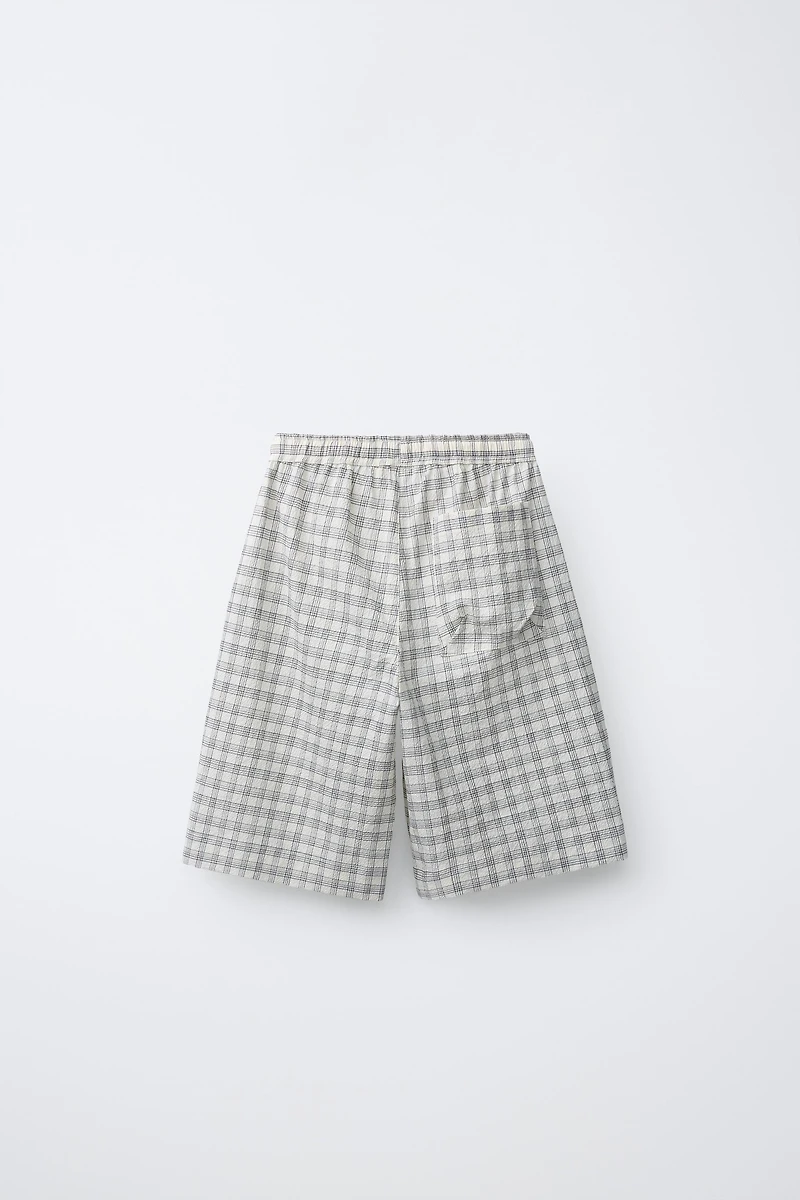 PUKAS SURF PLAID PRINT SHORTS