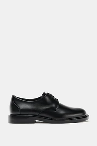 DERBYS EN CUIR À LACETS