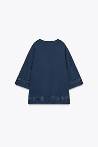 EMBROIDERED EYELET KNIT TOP
