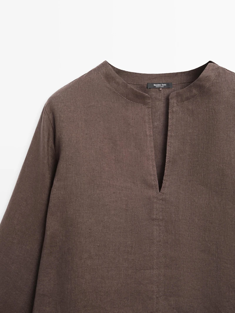 100% linen blouse with topstitching detail
