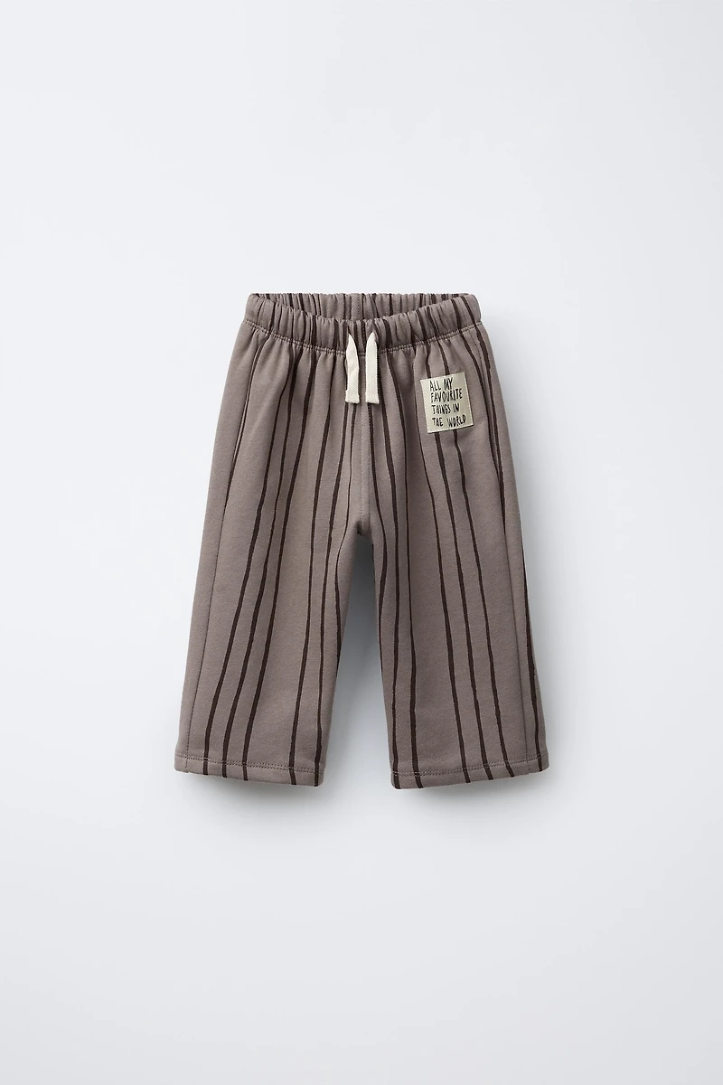 STRIPED PANTS WITH LABEL