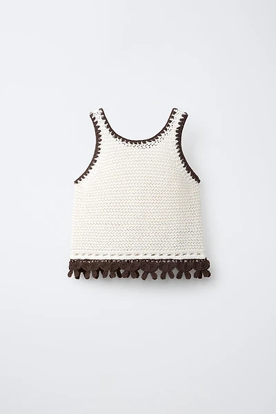 TOP EN MAILLE AVEC NŒUDS CONTRASTE