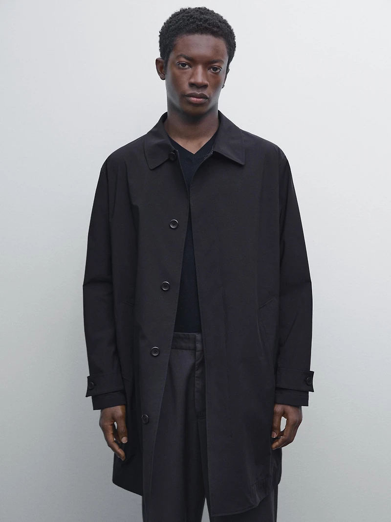 Lightweight trench coat with hidden buttons