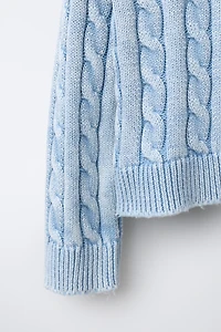 PULL EN MAILLE À TORSADES DÉLAVÉ