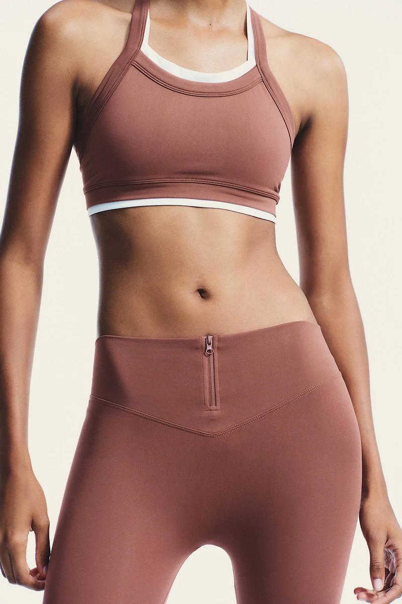 SEAMLESS ZIPPERED LEGGINGS
