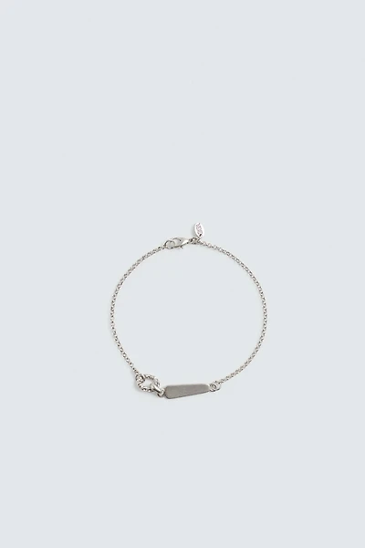 BRACELET À MAILLONS MÉTALLIQUES