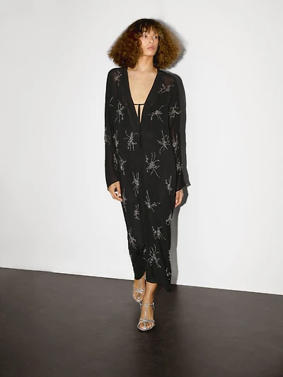 Flowing midi dress with embroidery