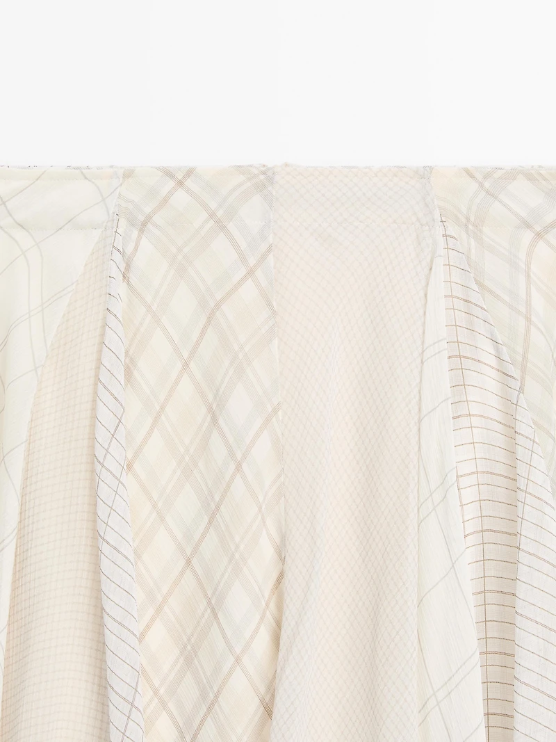 Jupe midi asymétrique à carreaux
