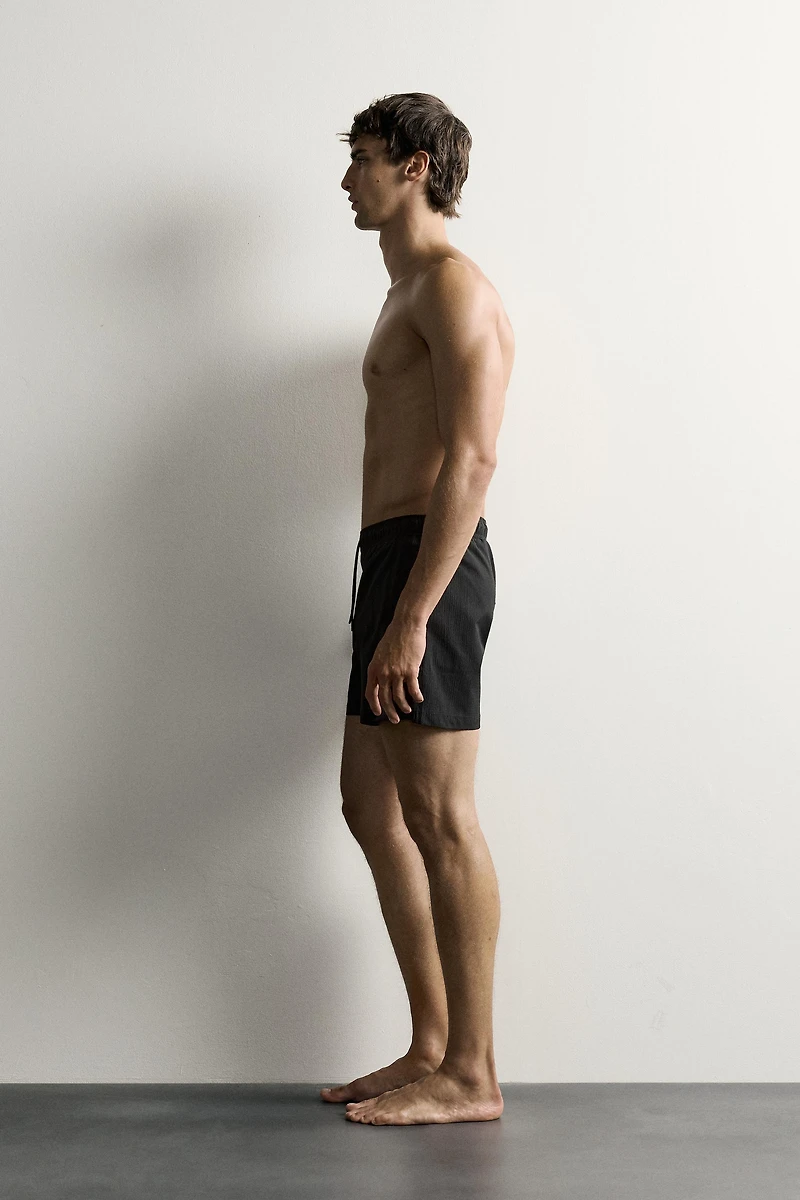 TEXTURED MID-LENGTH SWIMSUIT