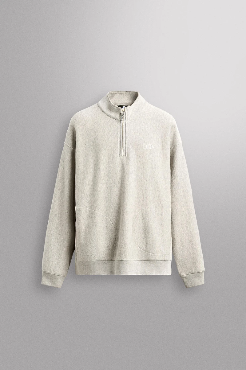 QUARTER-ZIP SWEATSHIRT WITH POCKETS
