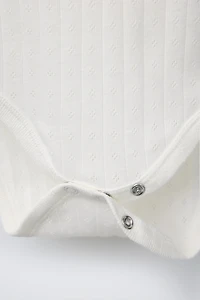 THREE-PACK OF SHORT SLEEVE BODYSUITS WITH TWIGS
