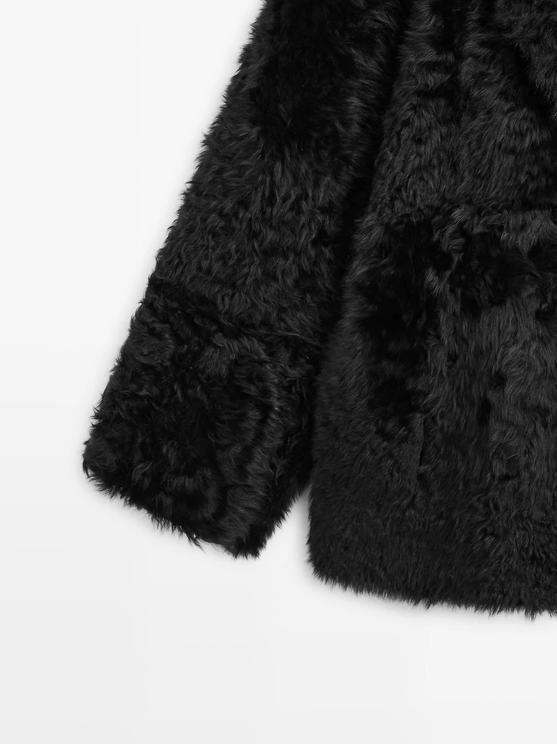 Sheepskin leather coat with lapel collar