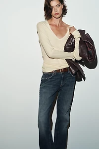 TRF SLUNG LOW-RISE STUDDED JEANS