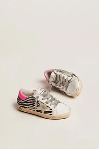 Super-Star Junior de piel y efecto potro con estampado cebra refuerzo del talón fucsia