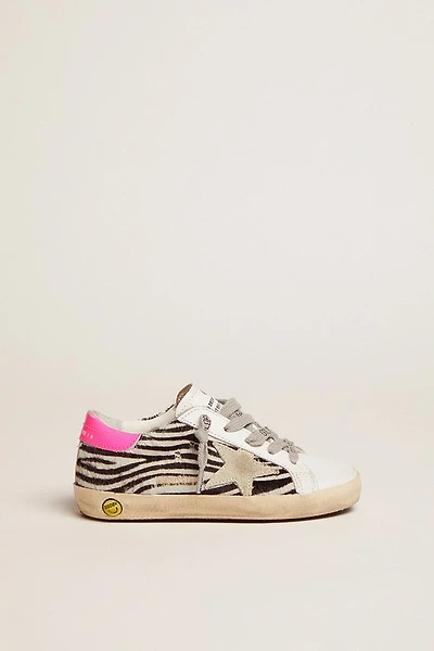 Super-Star Junior de piel y efecto potro con estampado cebra refuerzo del talón fucsia