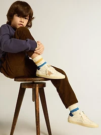Junior Super-Star nappa leather with a beige star and blue heel tab