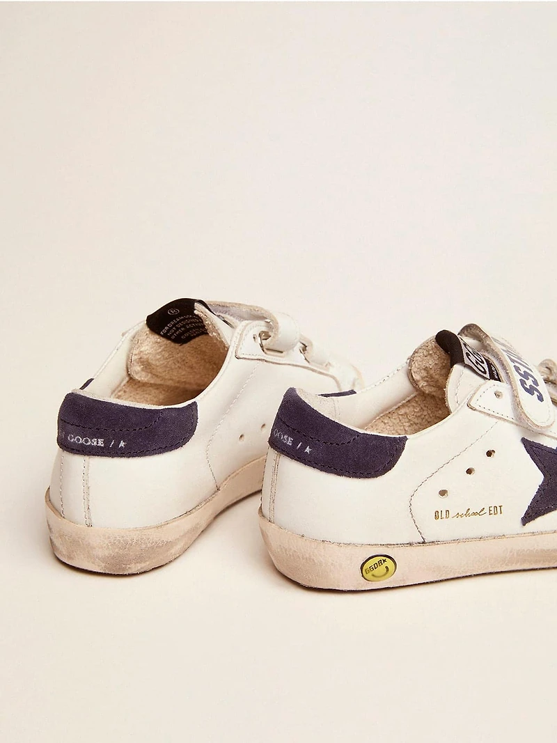 Old School Junior white leather with blue suede star and heel tab