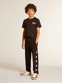 Black T-shirt with contrasting white logo on the front and maxi star back