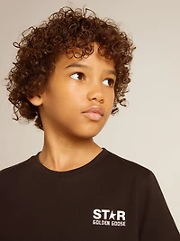 Black T-shirt with contrasting white logo on the front and maxi star back