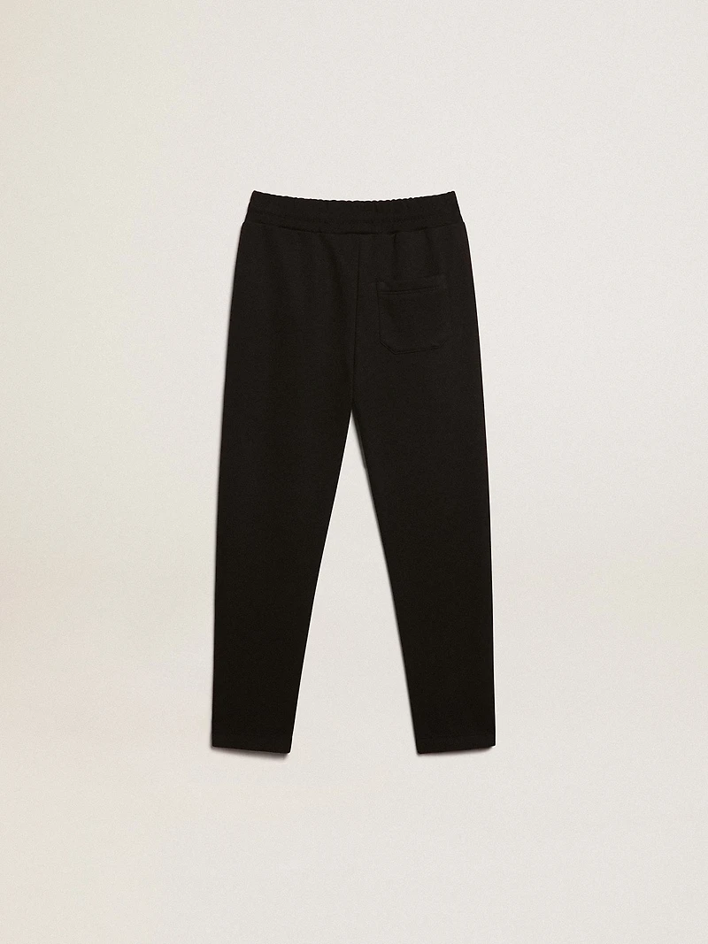 Boys’ black joggers with white stars