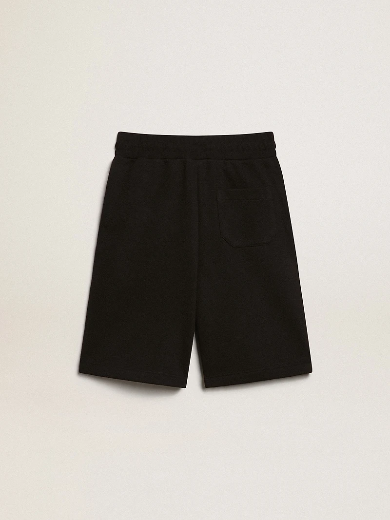 Boys’ black Bermuda shorts with white stars
