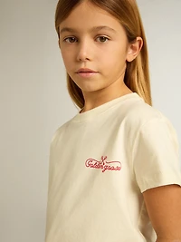Girls' cotton T-shirt worn white with red embroidery on the chest