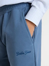 Kids’ blue joggers with embroidery