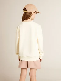 Sweatshirt aged white with multicolor Golden lettering on the front
