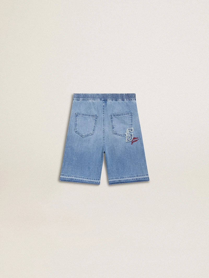 Kids’ denim shorts with embroidery on the back