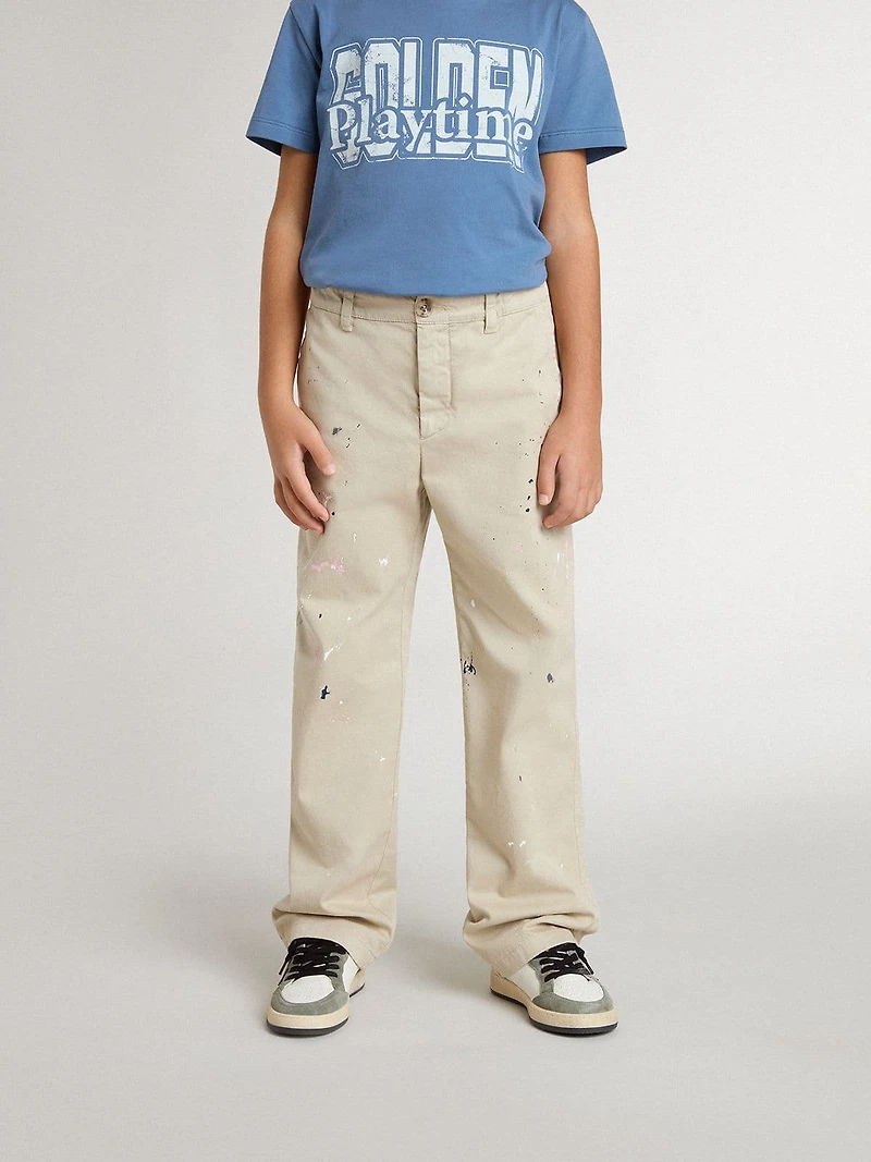 Kids’ beige chino pants with multicolor splashes