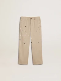Kids’ beige chino pants with multicolor splashes