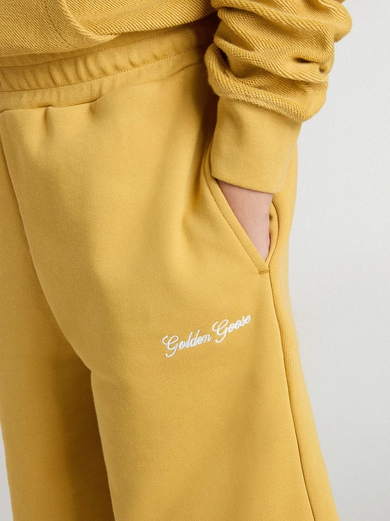 Kids jogging shorts ochre yellow with embroidery