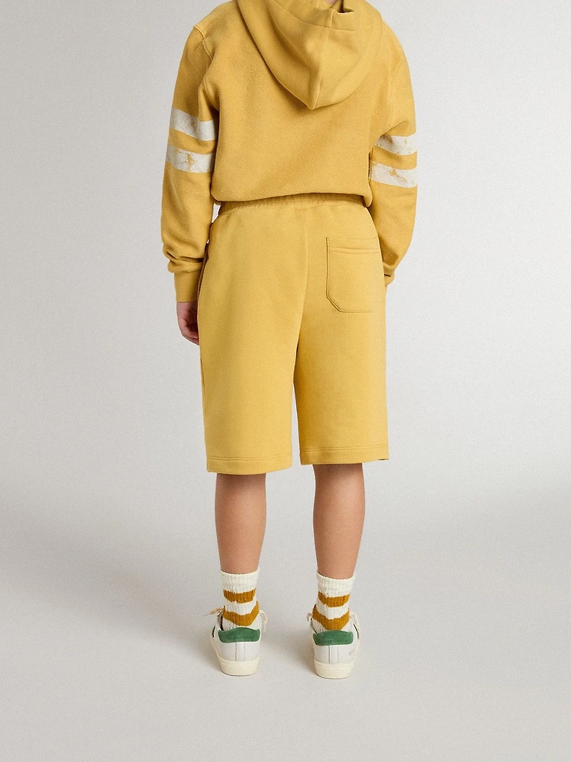 Kids jogging shorts ochre yellow with embroidery