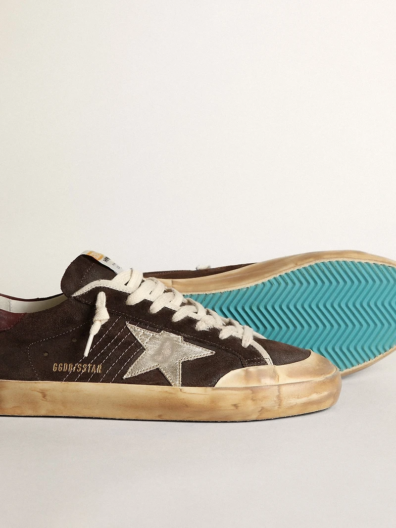 Men's Super-Star Penstar brown suede with a platinum star