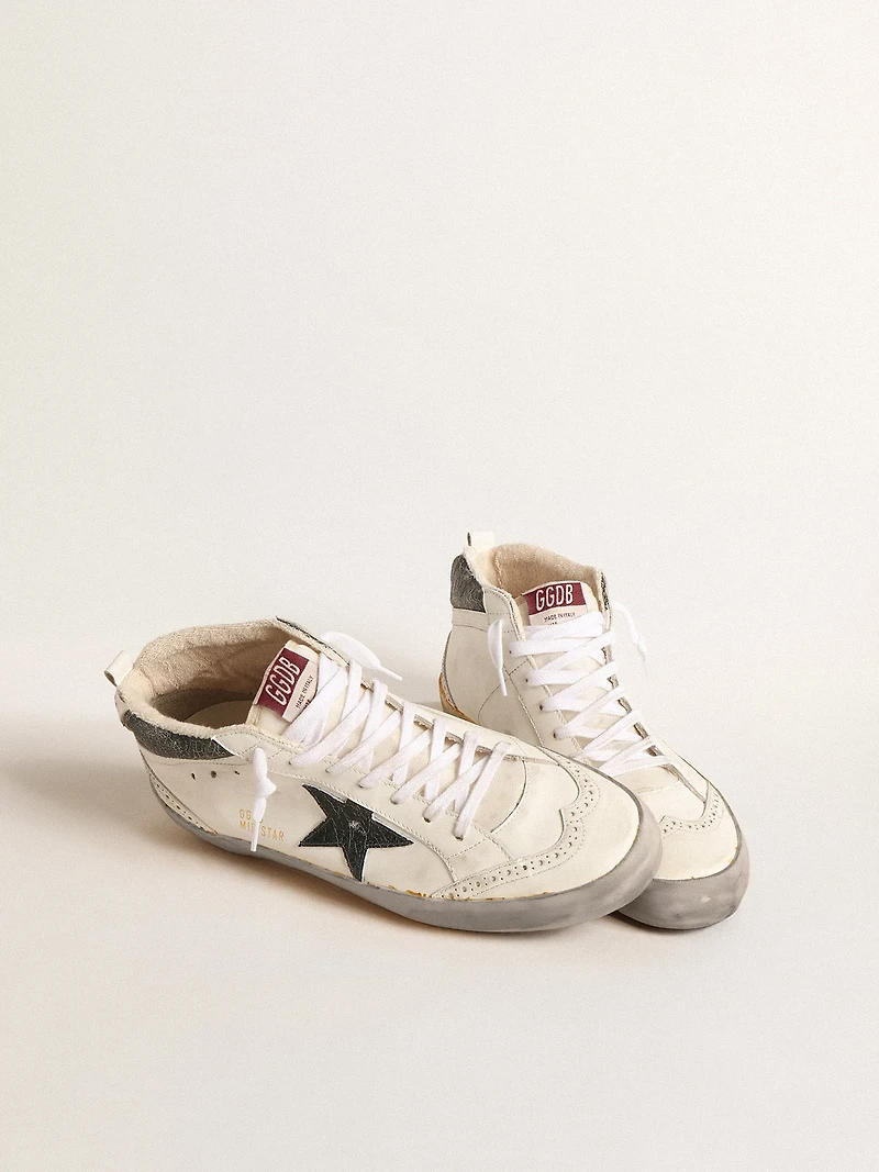 Mid star with green metallic leather and white flash