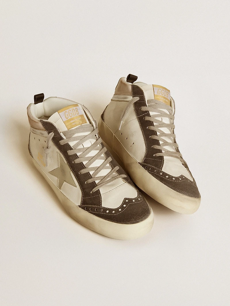Mid star with gray leather and metallic silver flash