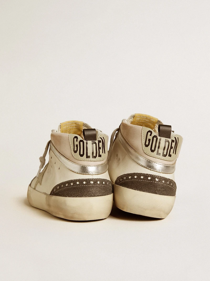 Mid star with gray leather and metallic silver flash