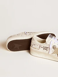 Stardan leather with all-over lettering and ice-gray suede star