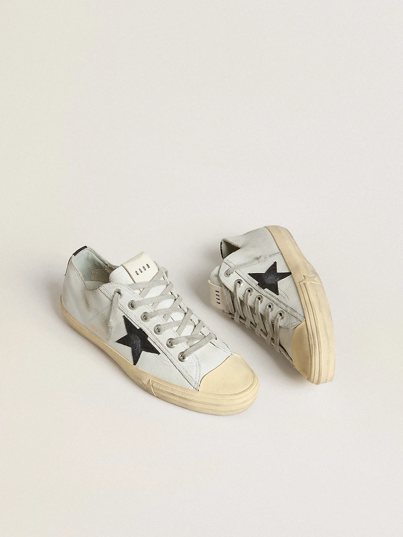 V-Star in leather with black crocodile-print leather star and heel tab