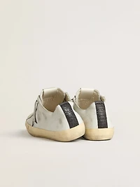 V-Star in leather with black crocodile-print leather star and heel tab