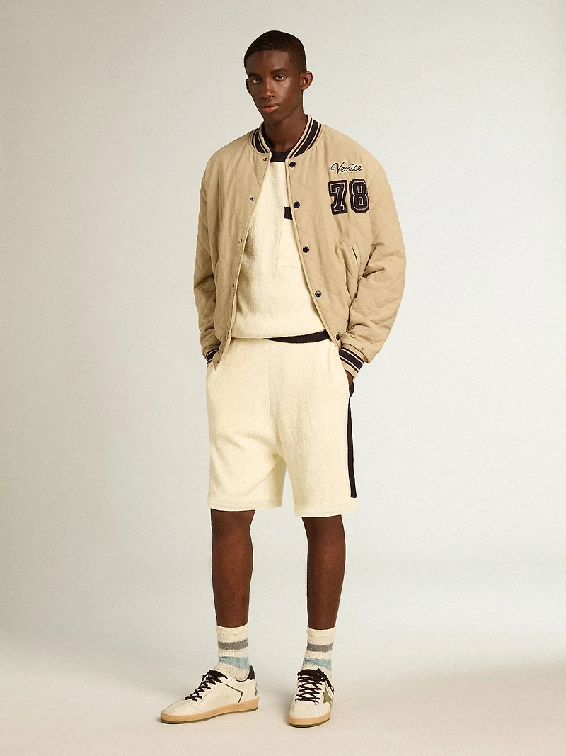 Khaki-colored quilted cotton bomber jacket