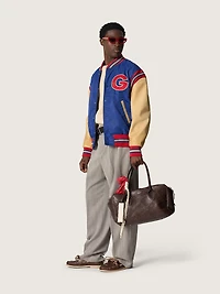 Men’s beige crew neck sweater with ‘Golden’ lettering on the back