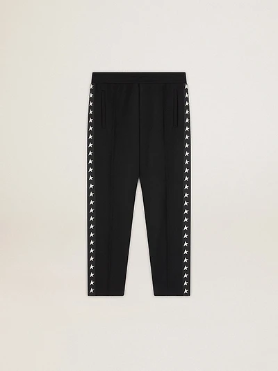 Men's black joggers with white stars on the sides
