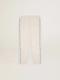 Men's white joggers with black stars on the sides