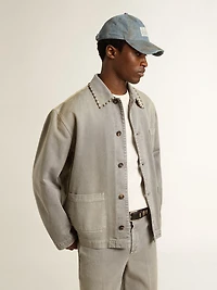 Men's gray denim jacket with studs