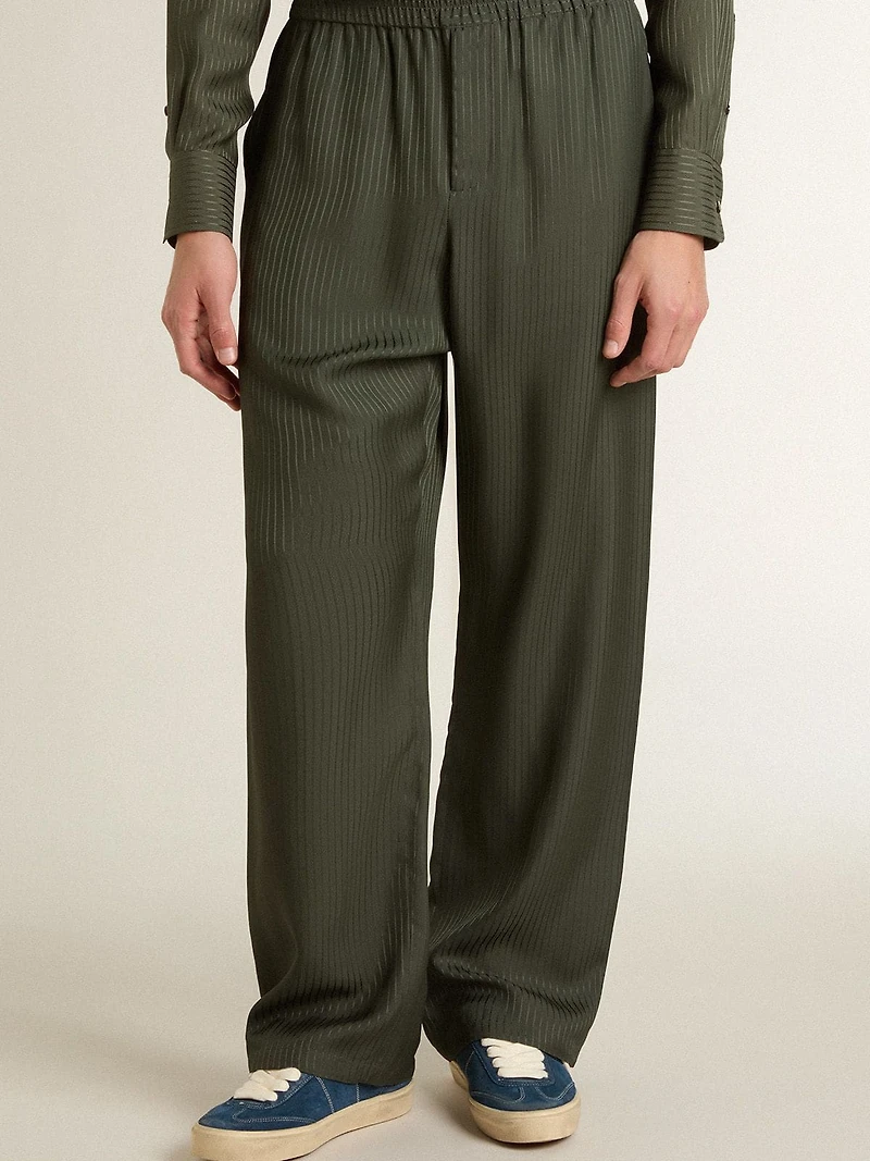 Men's dark green joggers with vertical stripes