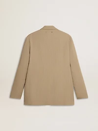 Men's beige pinstripe single-breasted jacket with an oversized fit