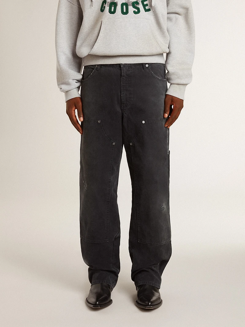 Men's distressed black cotton jeans with front patches