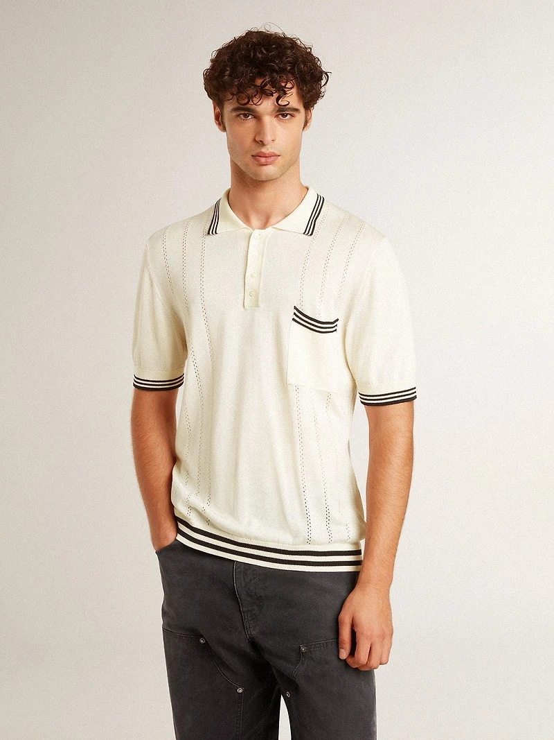 Men's worn-white knitted polo shirt with blue ribbing